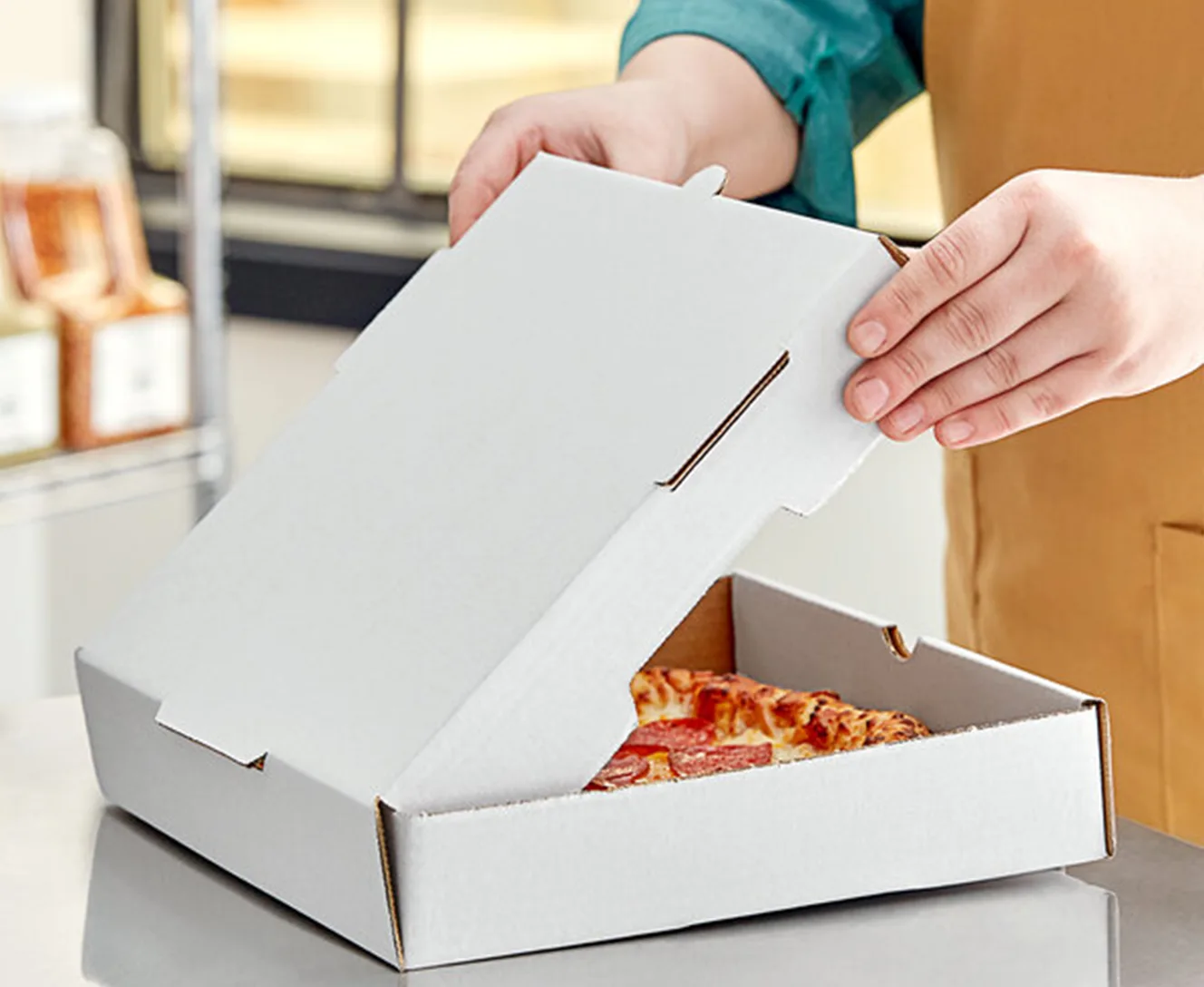 Le matériau de la boîte à pizza personnalisée.